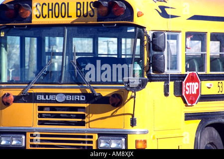 An image of a bright yellow, empty school bus. Could illustrate concepts of school, education, child safety, kid's future,, etc. Stock Photo