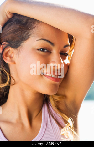 Woman smiling outdoors. Stock Photo