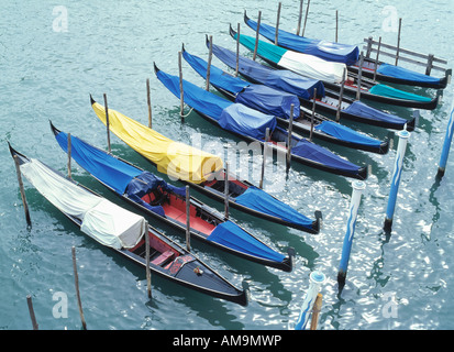 Eight docked gondolas in Venice. Stock Photo