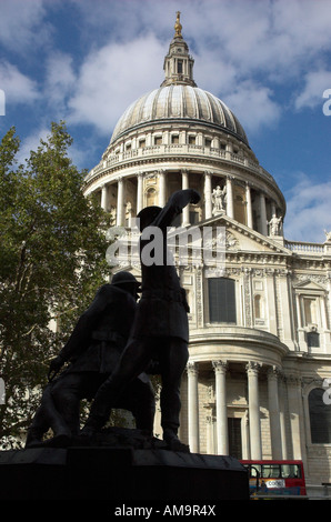 The memorial to London's firemen in the second world war silhouetted against St Pauls Cathedral Stock Photo