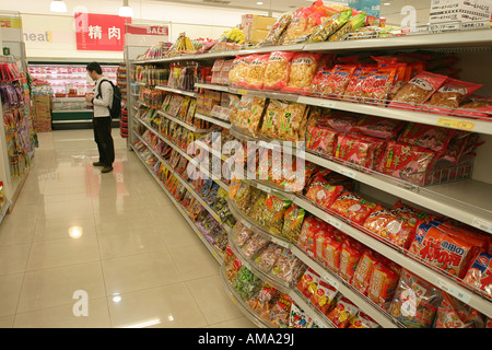 Chinese products and supermarket Clean designs and full shelves with interesting packaging Stock Photo