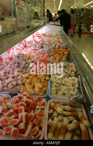 Chinese products and supermarket Clean designs and full shelves with interesting packaging Stock Photo