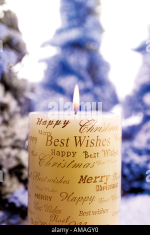 Burning Christmas candle Stock Photo