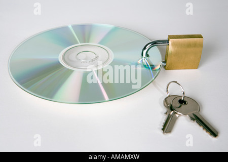 A CD with a padlock and keys Stock Photo