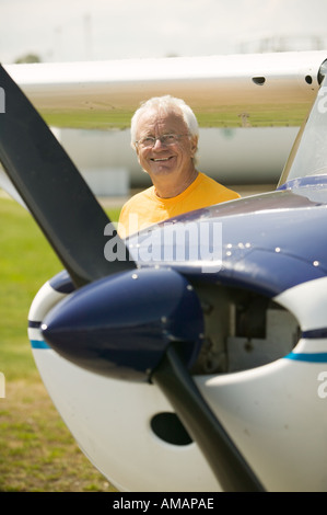 Senior caucasian male with Cessna aircraft Stock Photo