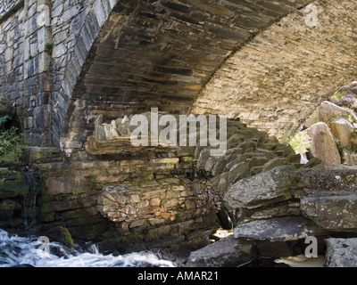 Old Drovers road packhorse bridge under A5 road bridge Pont Pen y benglog. Snowdonia National Park Ogwen Gwynedd North Wales UK Stock Photo