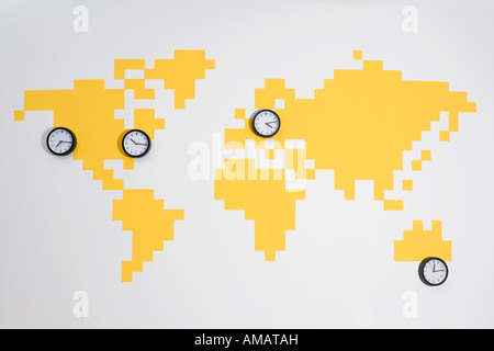 Clocks on a world map Stock Photo