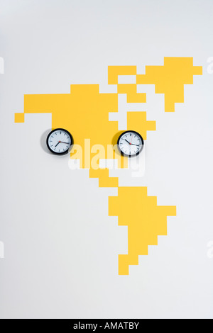 Clocks on a world map Stock Photo