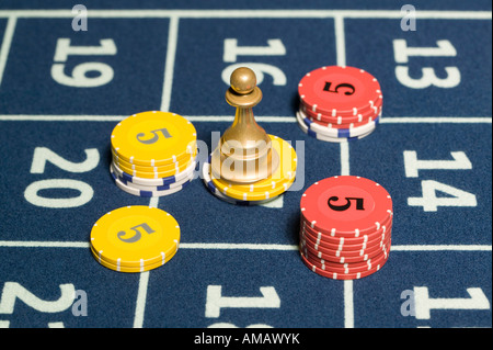 Roulette Win Marker with gambling chips on a roulette table grid Stock Photo