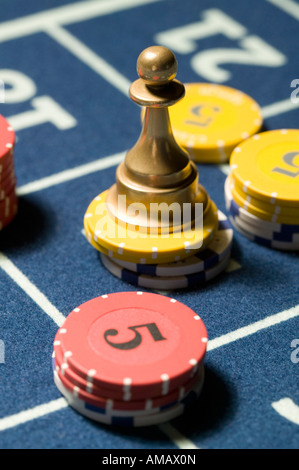 Stacks of gambling chips with Roulette Win Marker Stock Photo