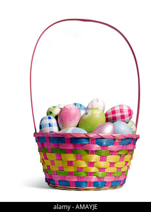 Wicker basket with painted Easter eggs and bunny isolated on white ...