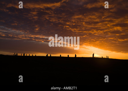 dh Neolithic standing stones RING OF BRODGAR ORKNEY Ring orange sunset cloudy dusk sky scottish historical sites uk henge circle scotland unesco site Stock Photo