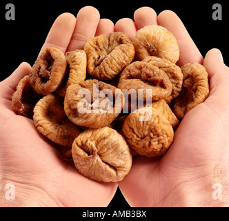 HANDFUL OF DRIED FIGS Stock Photo