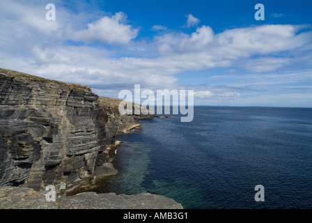 dh Clu Ber DEERNESS ORKNEY East coast seacliffs calm blue sea and sky rugged coastline summer Stock Photo