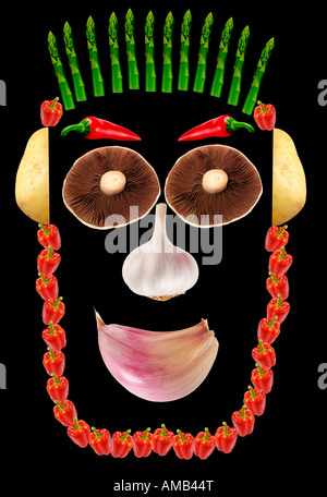 VEGETABLE FACE ON BLACK Stock Photo