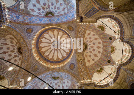 Complexity in Colour The highly decorated ceramic covered ceiling of the Blue Mosque is full of light and color Stock Photo