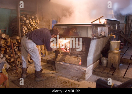 Traditional making of maple syrup by boiling down sap in an evaporator Ephrata New York Adirondacks Stock Photo