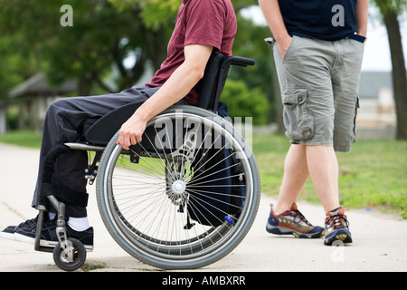 Handicapped man on a wheel chair. Stock Photo