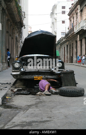 Cuba Havana an automechanic in the street Stock Photo