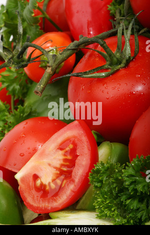 Ripe red tomatoes vegetables close up pictures images photos overhead from above very high resolution vertical format in USA US hi-res Stock Photo