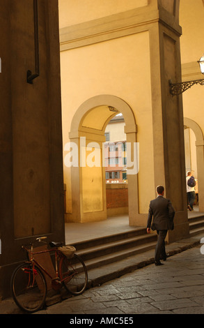 Man walking on Street of Florence Italy Stock Photo