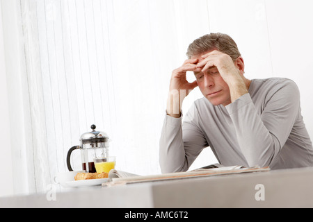 Man Reading Newspaper Stock Photo