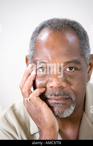 Portrait of a middle-aged man looking sad Stock Photo