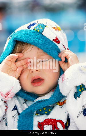 Boy Rubbing Eye Stock Photo