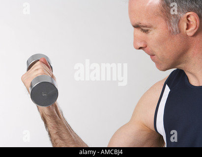 Man Lifting Weights Stock Photo