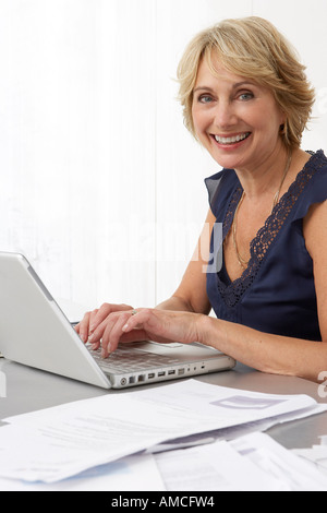 Woman Using Laptop Stock Photo