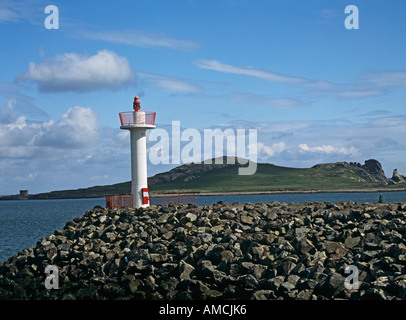 HOWTH REPUBLIC OF IRELAND EUROPEAN UNION June Lighthouse on a rocky promontory with Ireland's Eye Island in the background Stock Photo