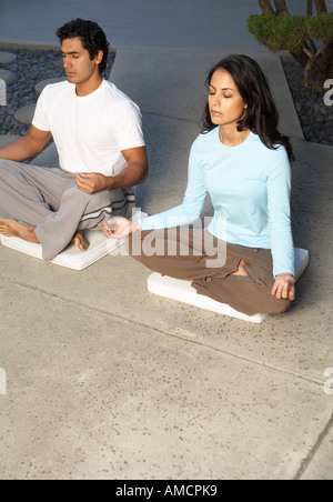 Couple Doing Yoga Stock Photo