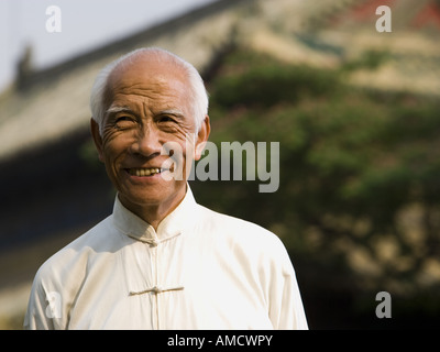 Man smiling outdoors Stock Photo