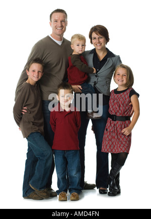 Family portrait with six people smiling Stock Photo