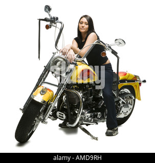 Woman sitting on motorcycle Stock Photo