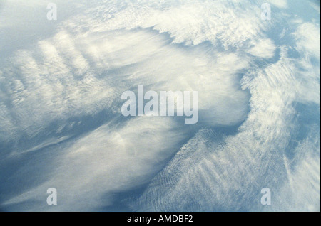 Clouds that form the shape of an angel in the blue sky Stock Photo