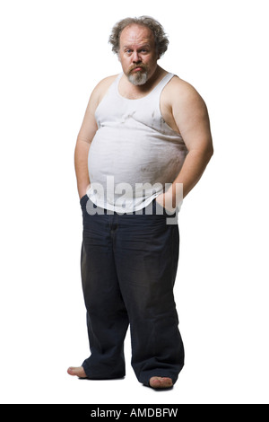 Disheveled man with hands in pockets Stock Photo