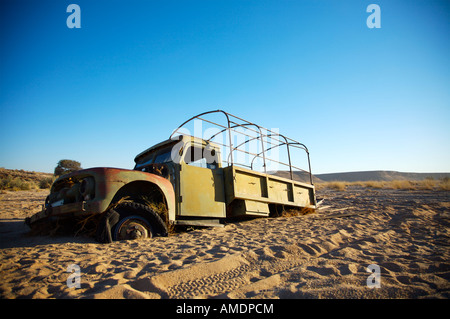 abandoned lorry in dry river bed Namibia Africa Stock Photo