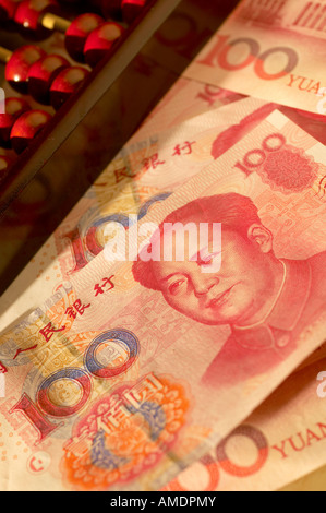 Chinese currency notes with abacus Stock Photo