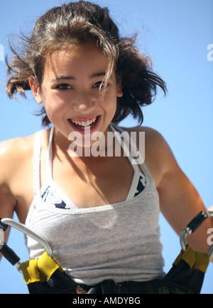 Girl having a good time bungee jumping Stock Photo