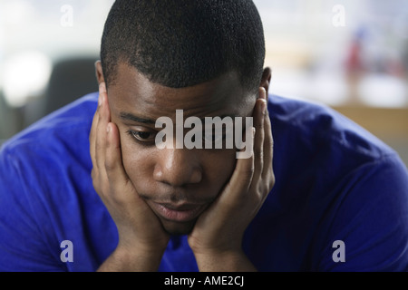 Close up of a depressed young man. Stock Photo