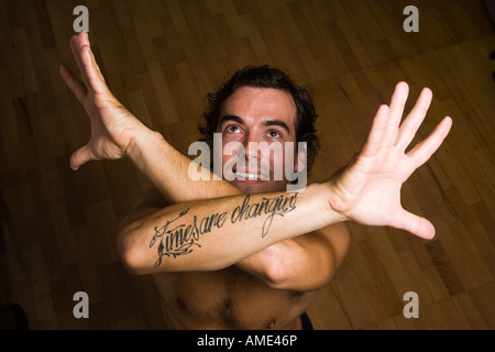 content man with crossed arms Stock Photo