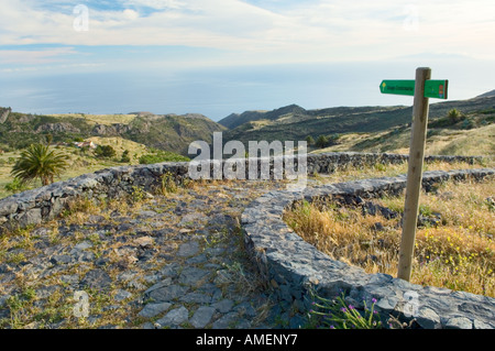 La Gomera, Canary Islands. A path leads to the Dragon Tree north of Alajero.  The island of El Hierro in the distance Stock Photo