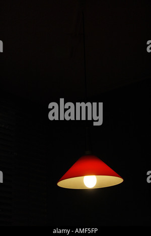 Glowing hanging red lamp Stock Photo