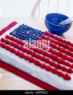 Cake topped with berries to make an American flag Stock Photo