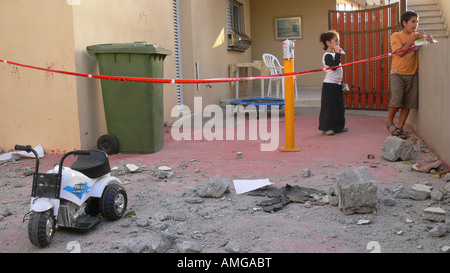 Israel Sderot house damaged by a Qassam rockets launched by Hamas from Gaza damaged children toys May 8th 2007 Stock Photo