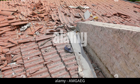 Israel Sderot house damaged by a Qassam rockets launched by Hamas from Gaza Damaged roof May 16th 2007 Stock Photo
