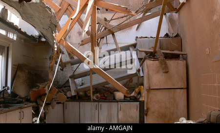 Israel Sderot house damaged by a Qassam rockets launched by Hamas from Gaza collapsed roof and ceiling May 31st 2007 Stock Photo