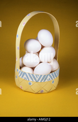 Putting all your eggs in one basket Stock Photo