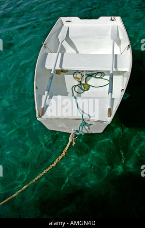 White rowing boat tied up Gustavia Harbour St Barts Stock Photo